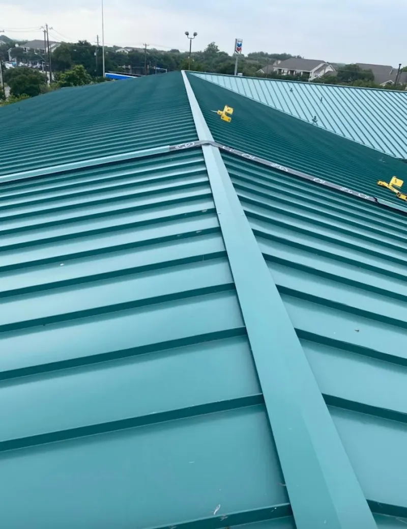 Green commercial metal roof ridge and valley for Metal Roof Repair in Ardmore